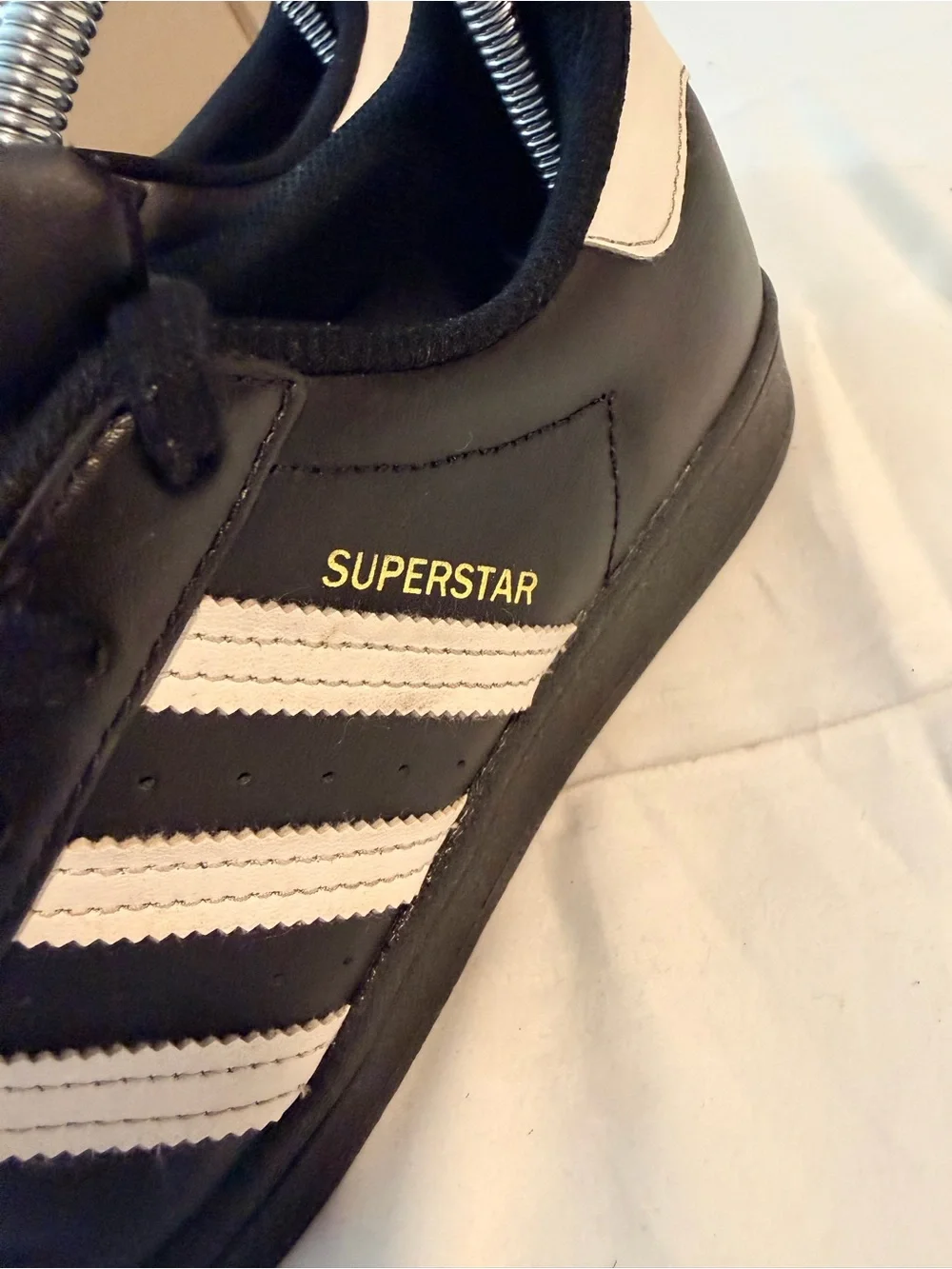 adidas Kids Black Sneakers with White Stripes and Gold Logo
